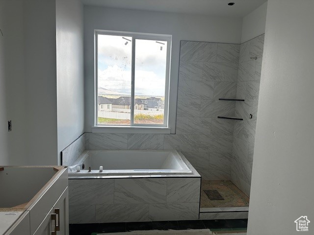 Bathroom with independent shower and bath