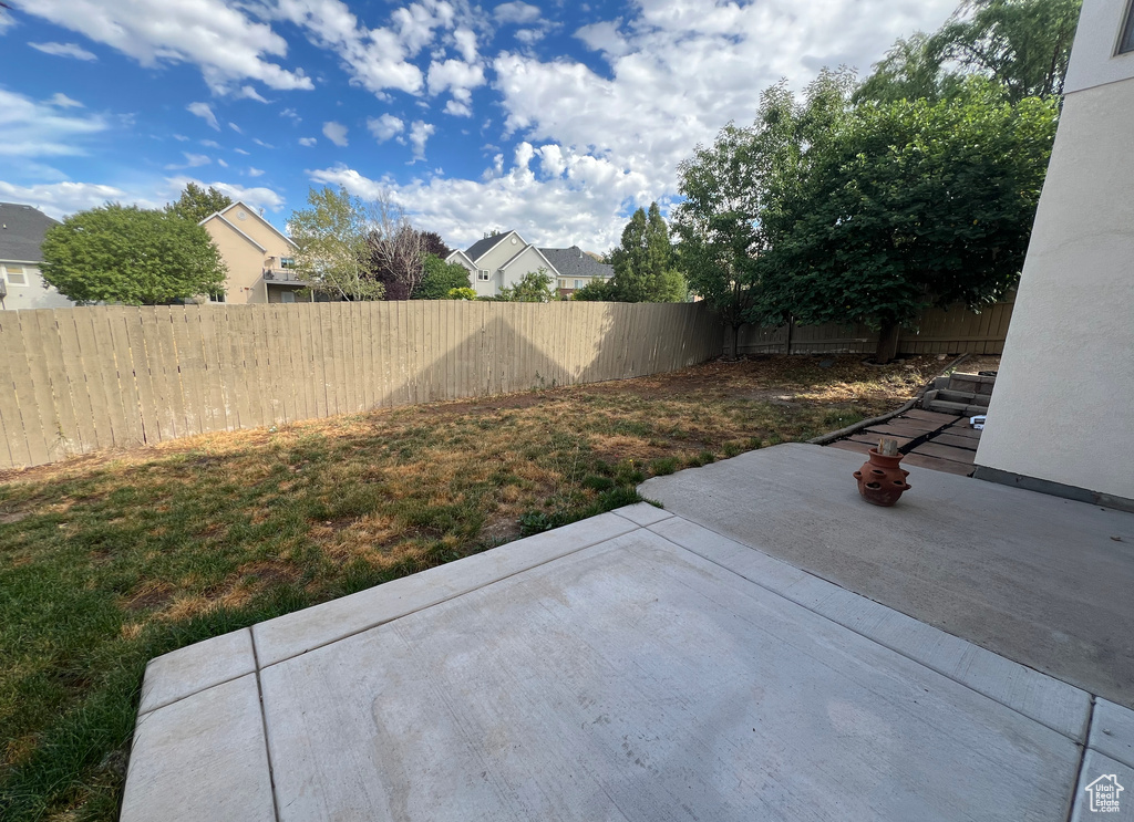 View of yard with a patio area