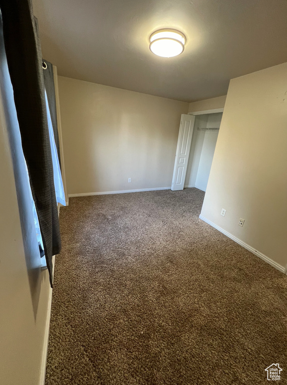 Spare room with carpet floors