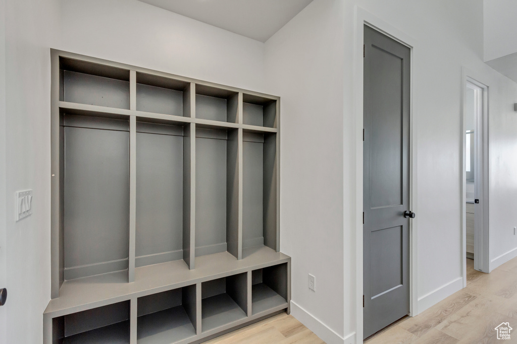 Mudroom featuring light wood-type flooring