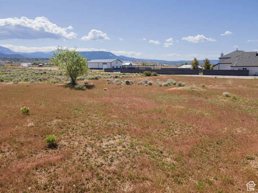 View of yard with a mountain view