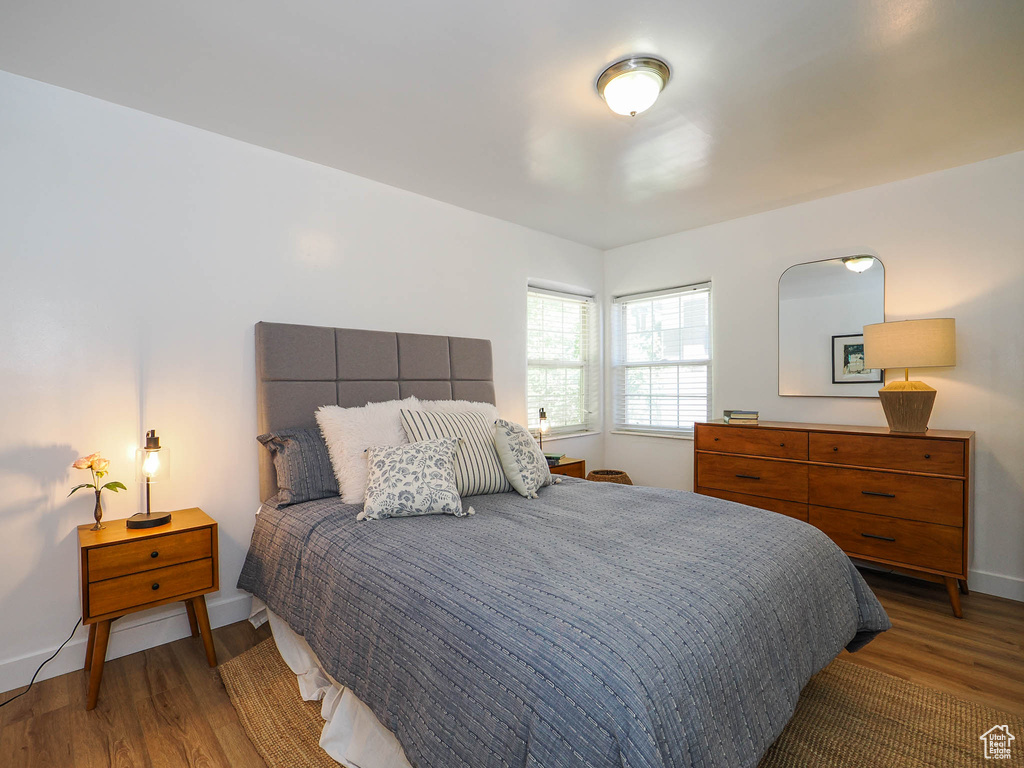 Bedroom featuring wood-type flooring