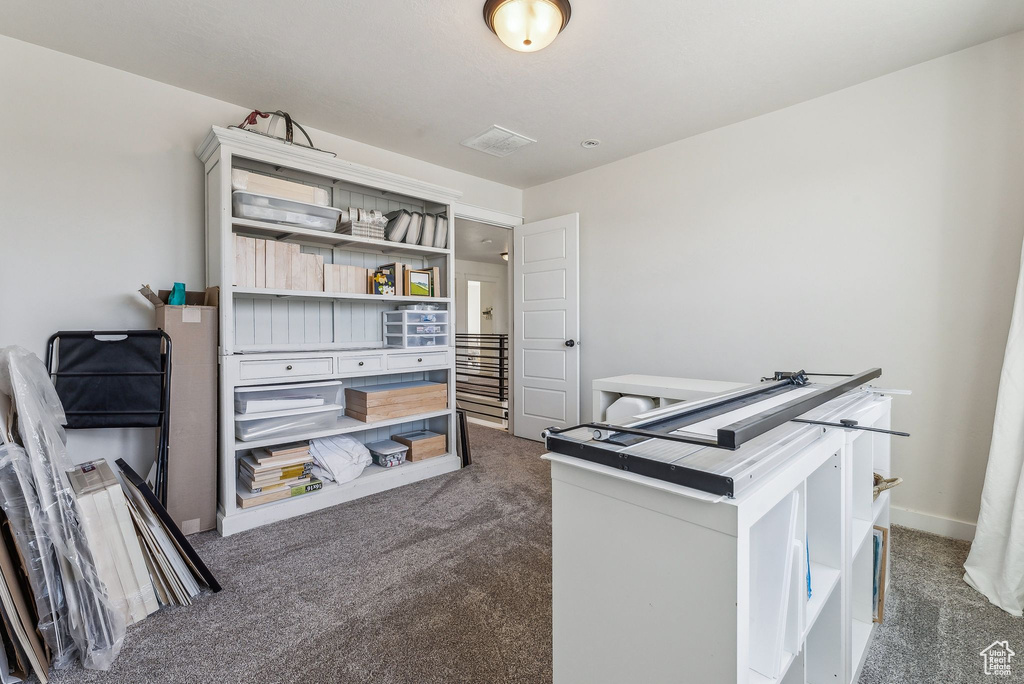 View of carpeted home office