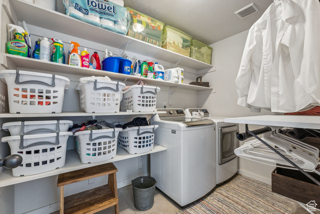 Laundry room featuring washing machine and dryer