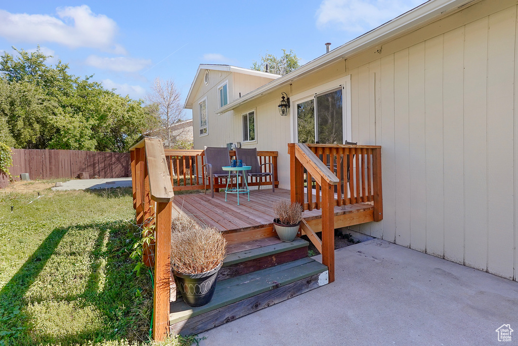 Deck featuring a yard