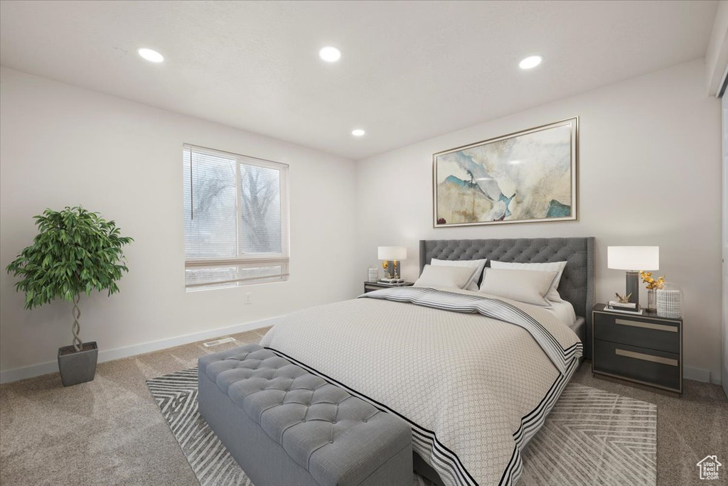 Bedroom with carpet flooring