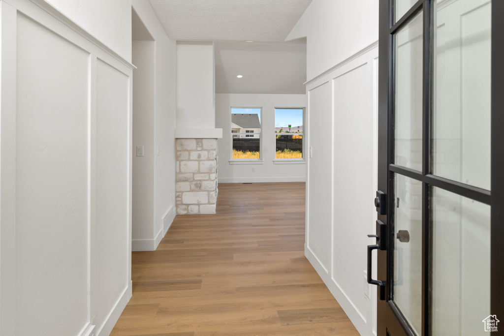 Hall with light wood-type flooring