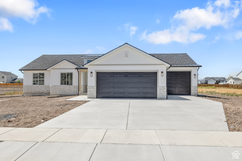 View of front of home with a garage