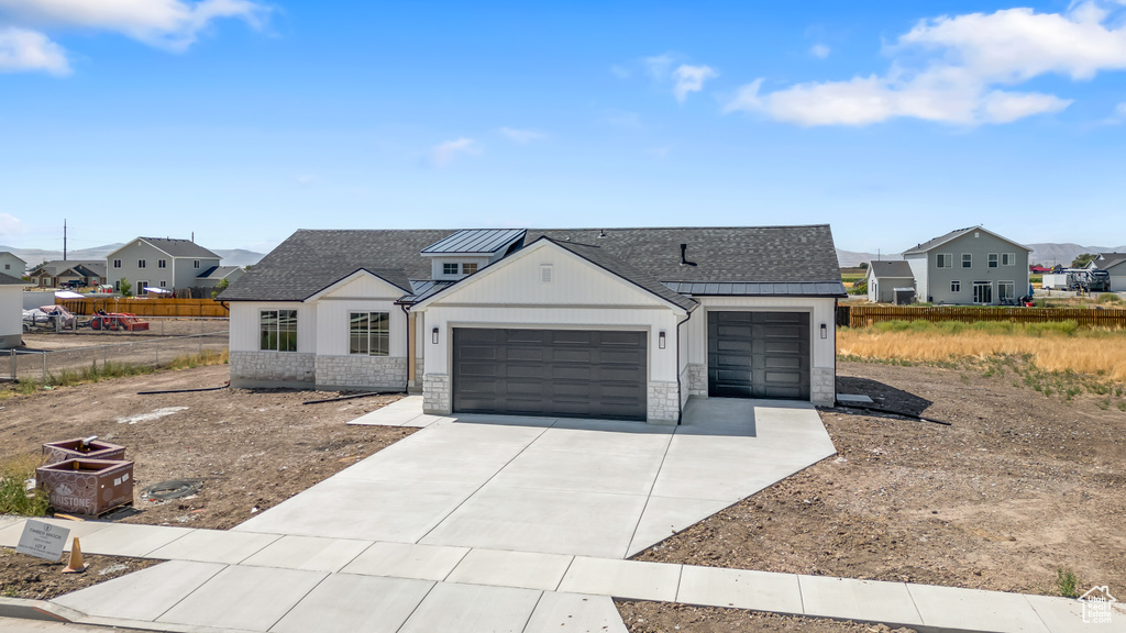 View of front facade with a garage