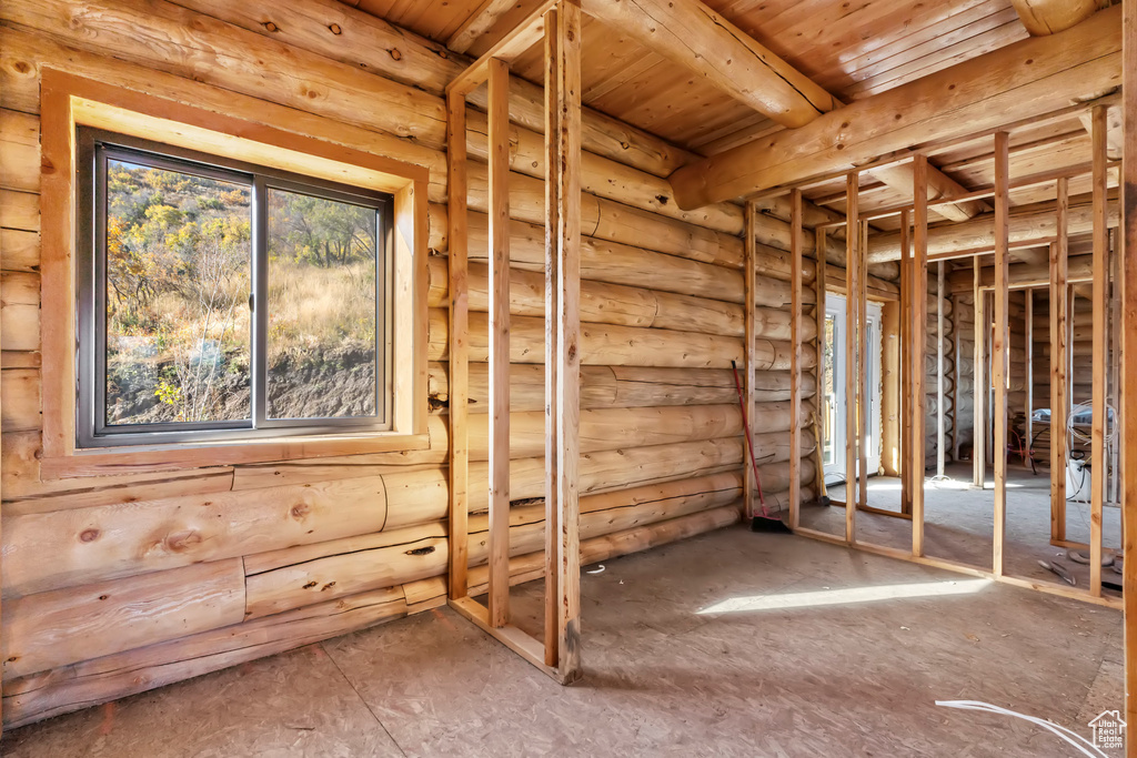 Misc room with rustic walls