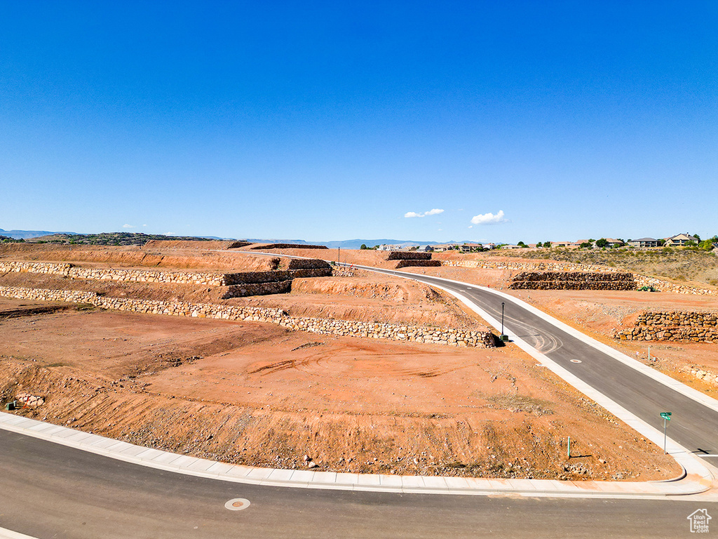 View of yard with a rural view