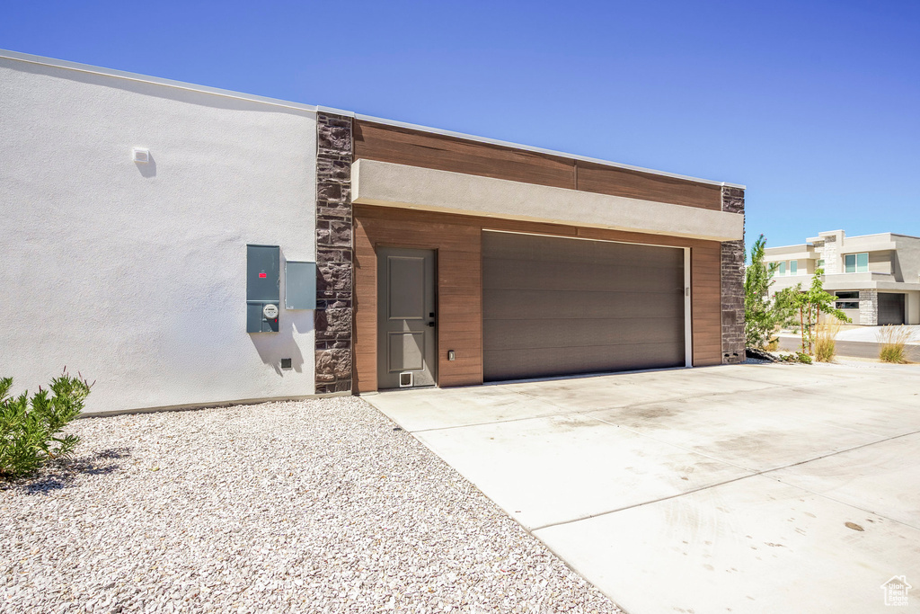 View of front of house with a garage