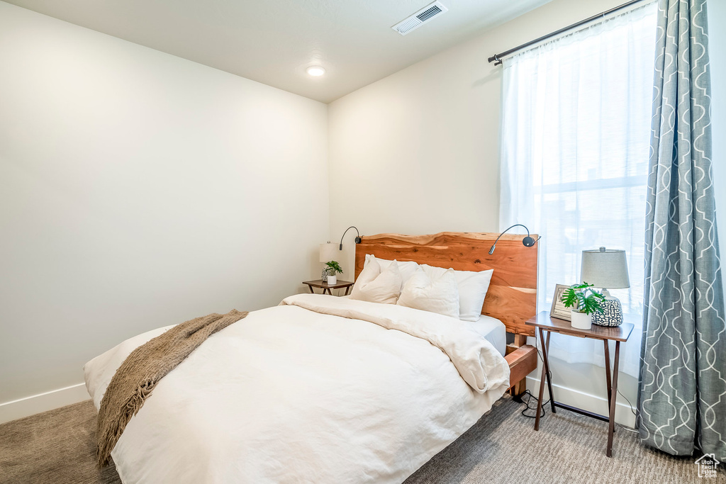 View of carpeted bedroom