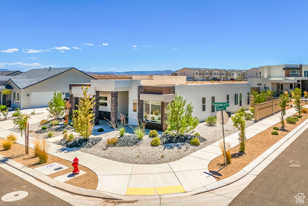 View of front of home with a garage