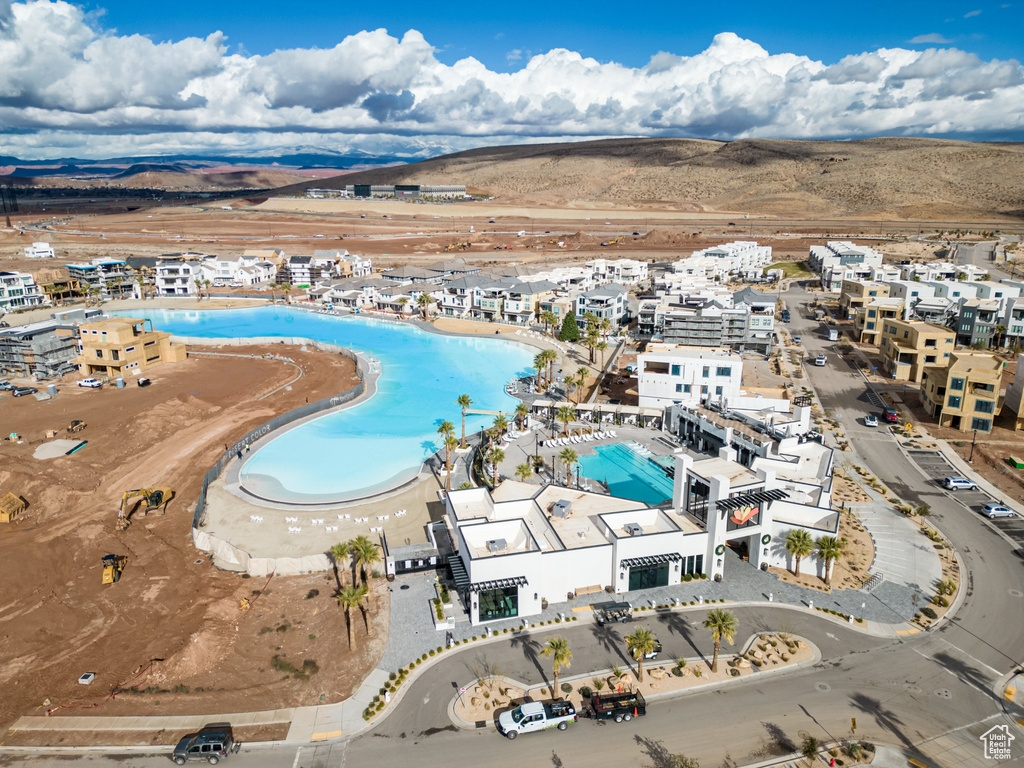 Birds eye view of property with a mountain view