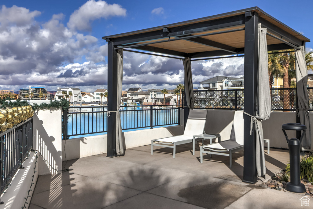 View of patio featuring a swimming pool