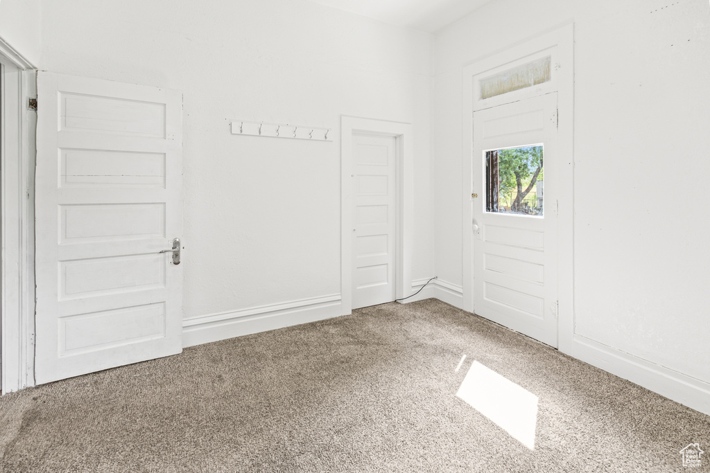 View of carpeted foyer