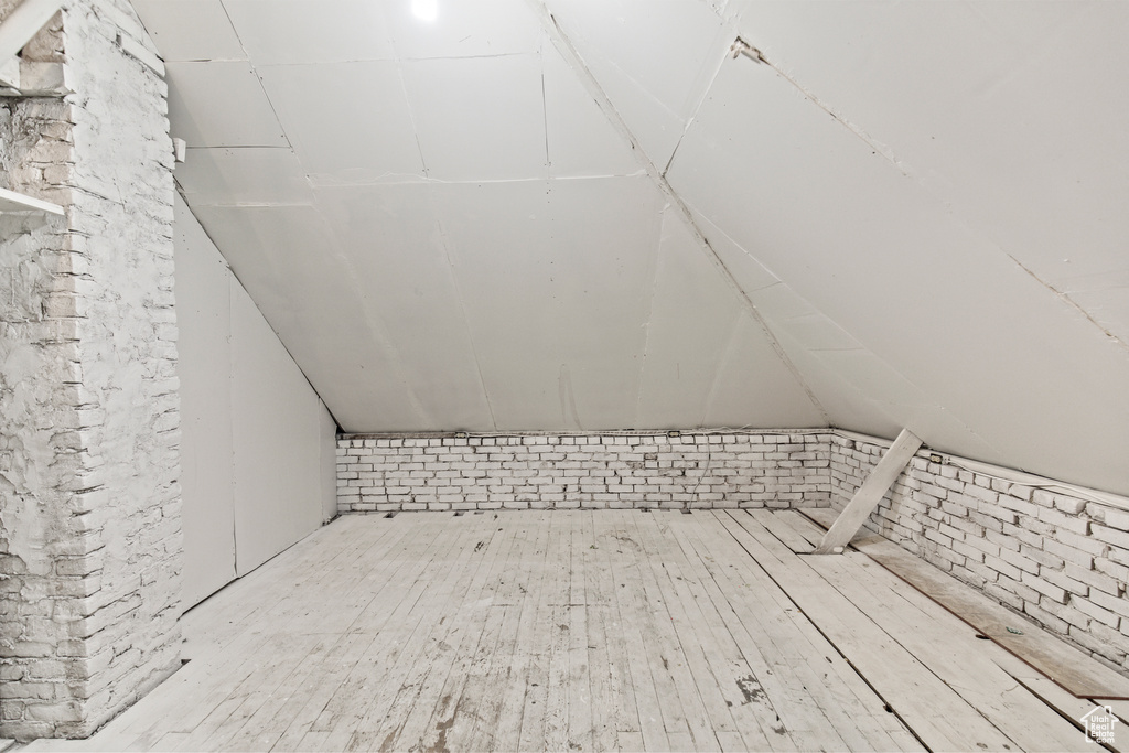 Additional living space with hardwood / wood-style floors