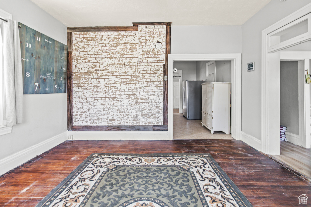 Interior space with hardwood / wood-style floors