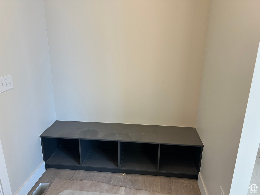 Mudroom with light hardwood / wood-style flooring