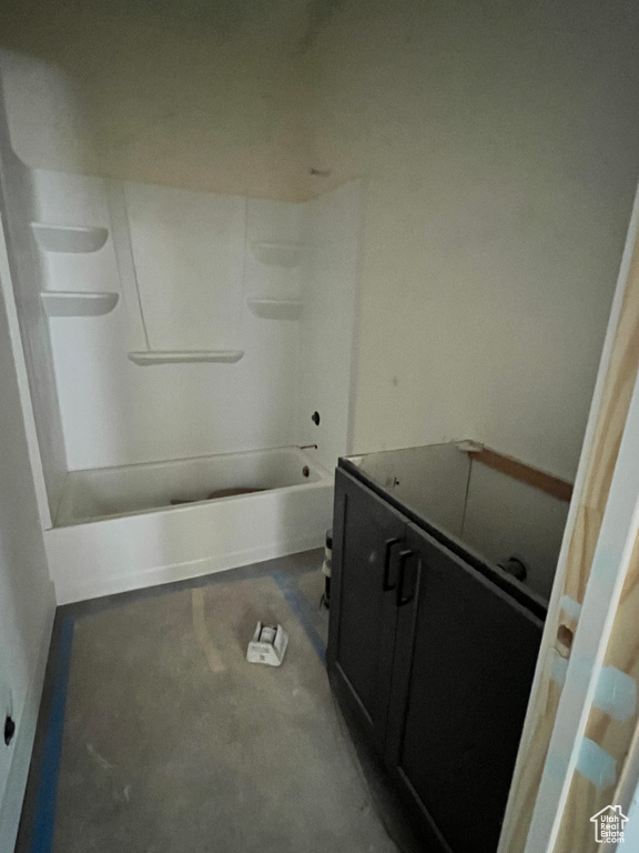 Bathroom featuring shower / bathtub combination and vanity