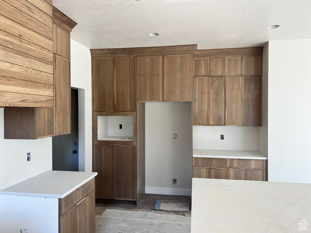 Kitchen with a textured ceiling