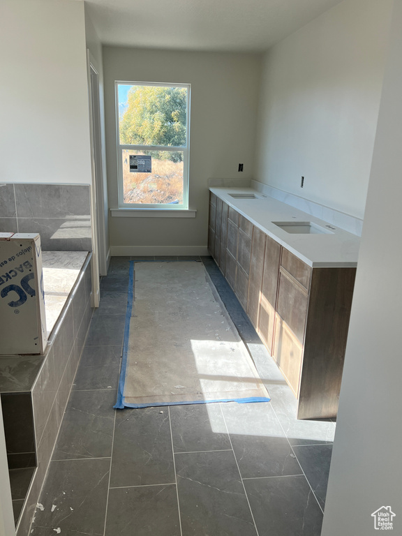 Bathroom featuring tile patterned flooring