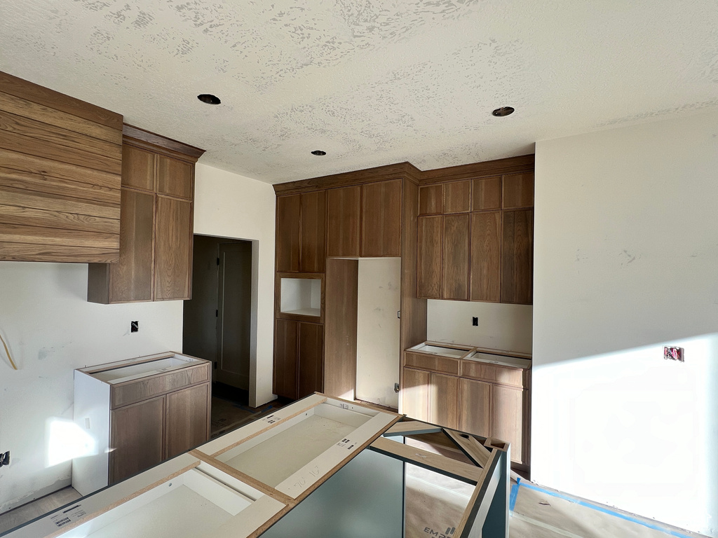 Kitchen with a textured ceiling