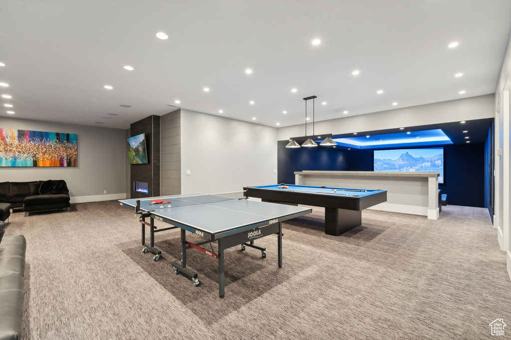 Recreation room featuring light colored carpet and pool table