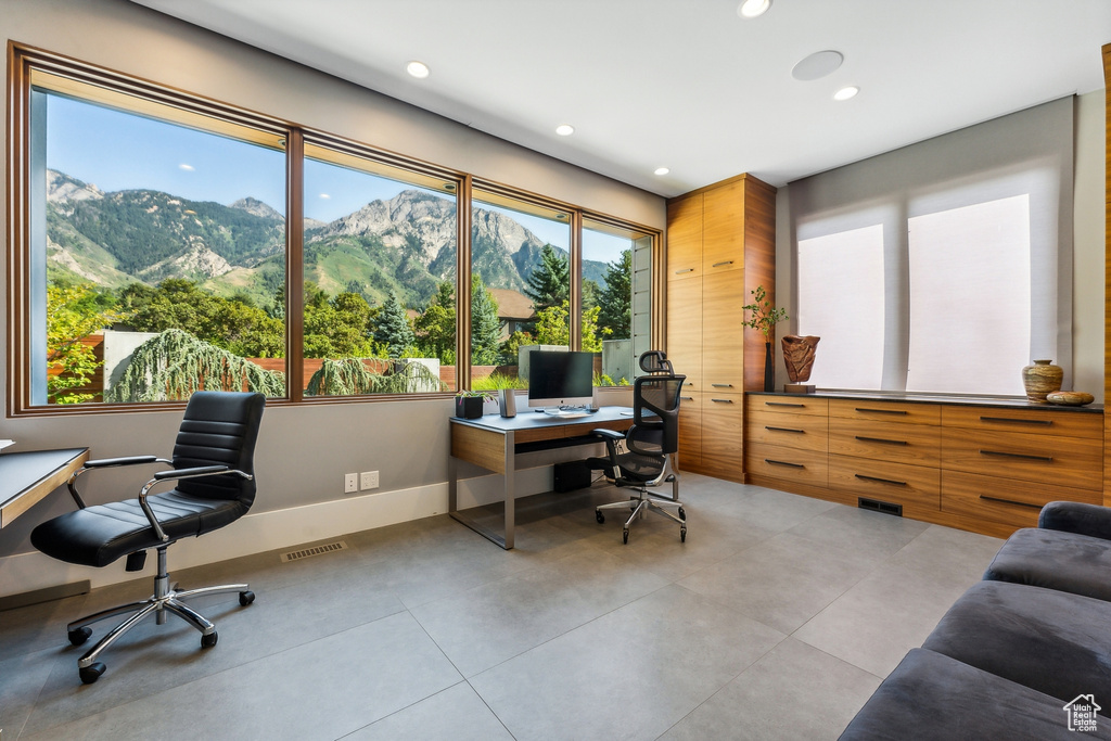 Office area with light tile patterned flooring