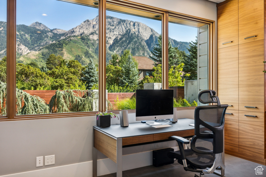 Office area with a mountain view and plenty of natural light