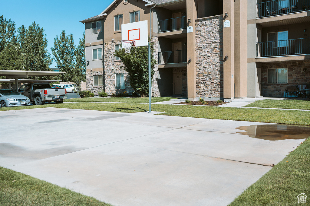 View of property featuring a carport