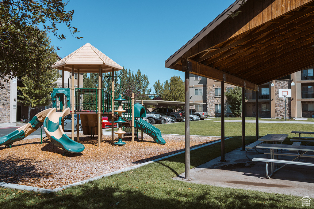 View of play area featuring a yard