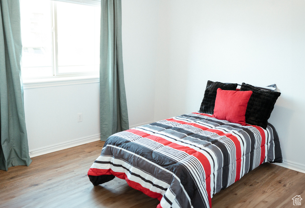 Bedroom with light wood-type flooring