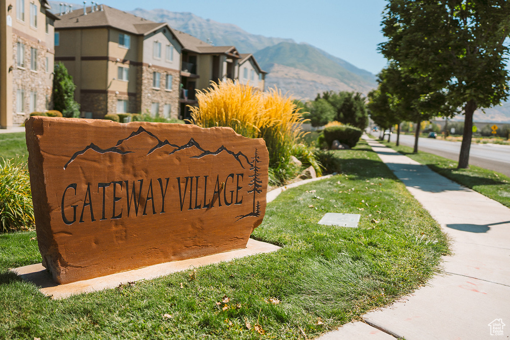 Community sign featuring a mountain view