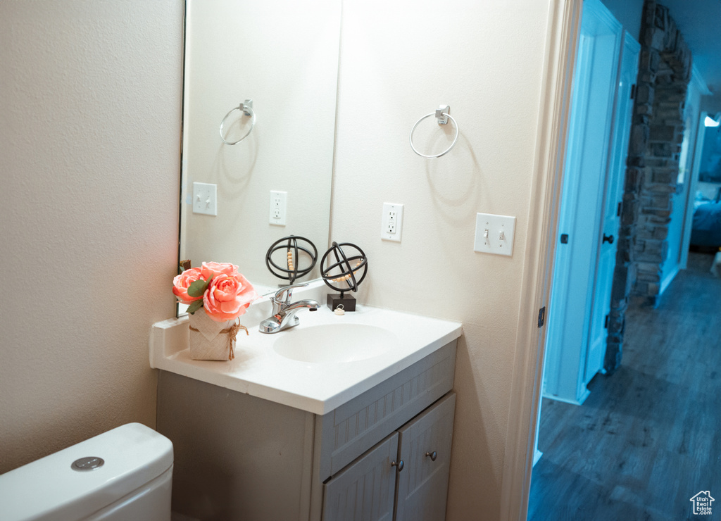 Bathroom with vanity and toilet