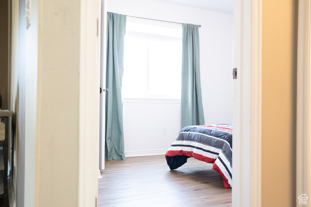 Bedroom featuring hardwood / wood-style flooring