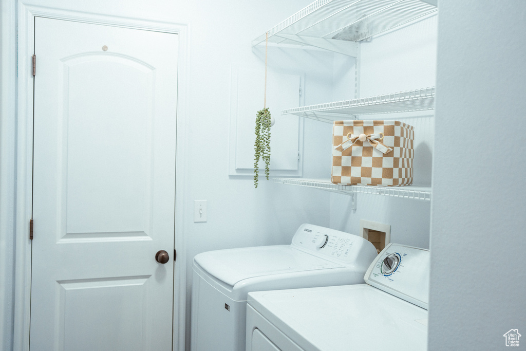 Laundry area featuring separate washer and dryer