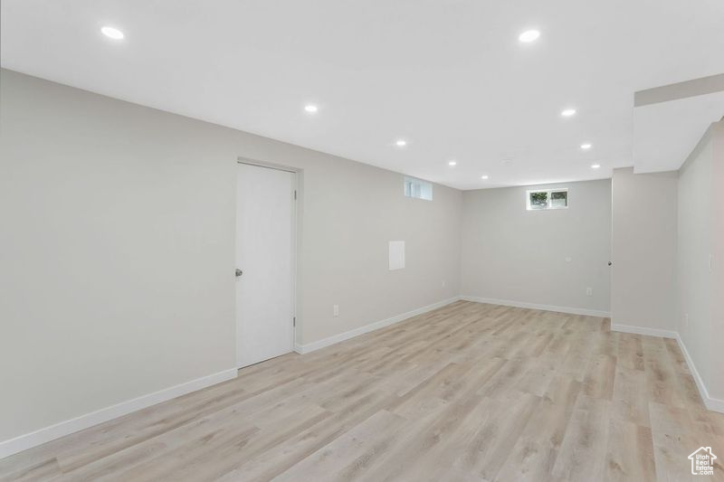 Spare room featuring light hardwood / wood-style flooring