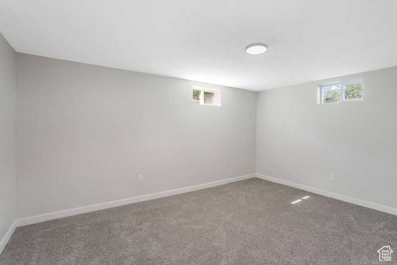 View of carpeted spare room