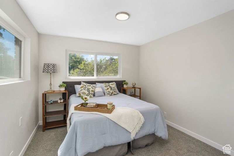 View of carpeted bedroom