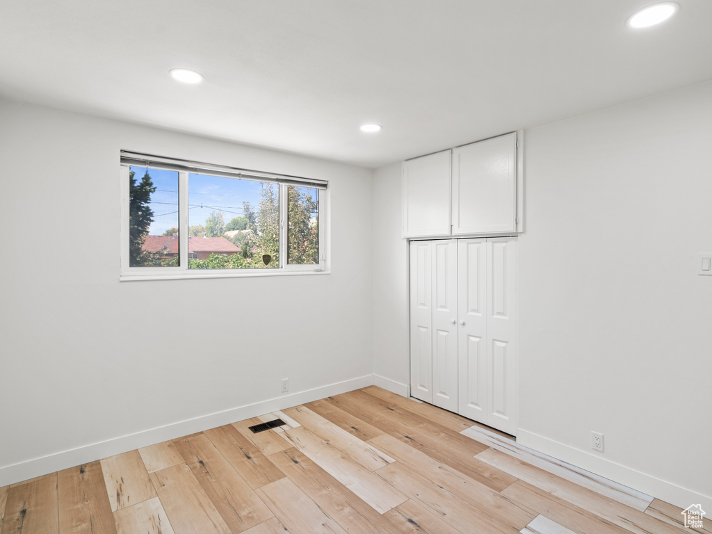 Unfurnished room featuring light hardwood / wood-style floors