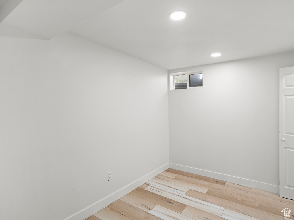 Unfurnished room featuring light wood-type flooring