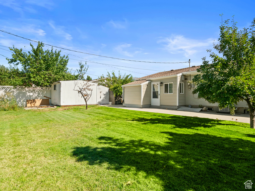 View of yard with a patio