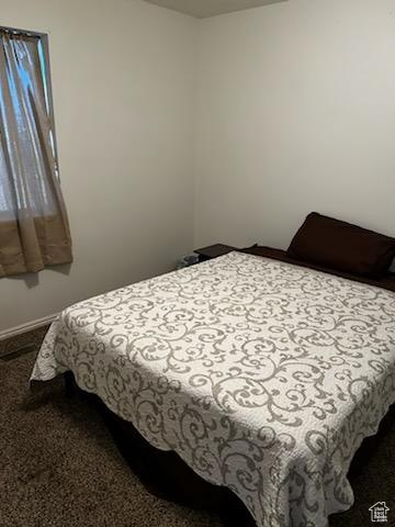 Bedroom featuring carpet