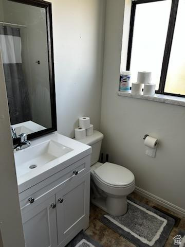 Bathroom with toilet and vanity