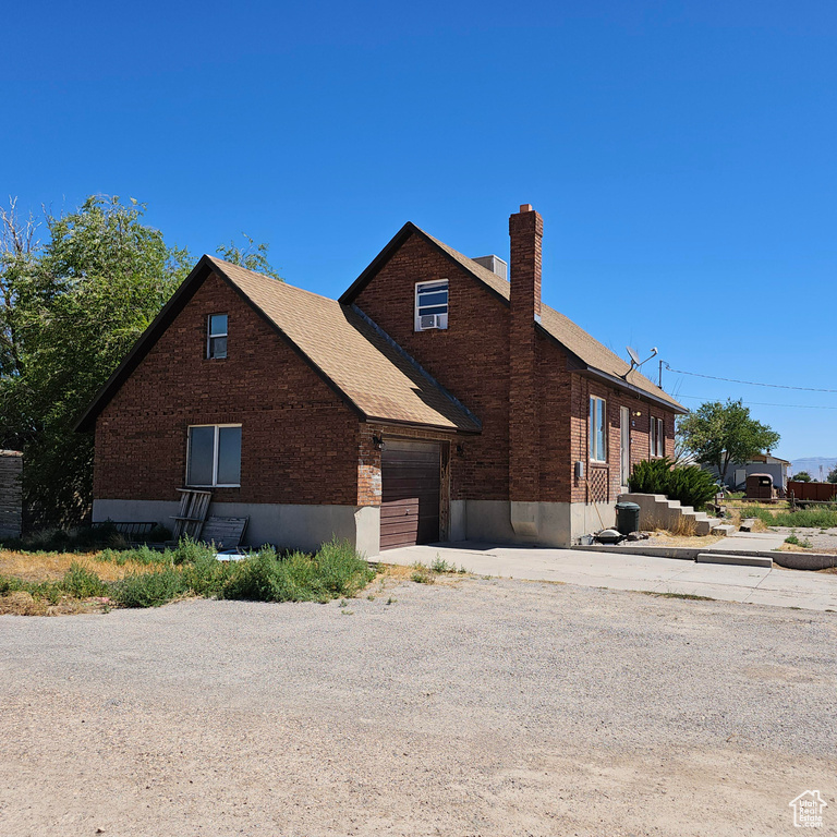 View of front facade with a garage