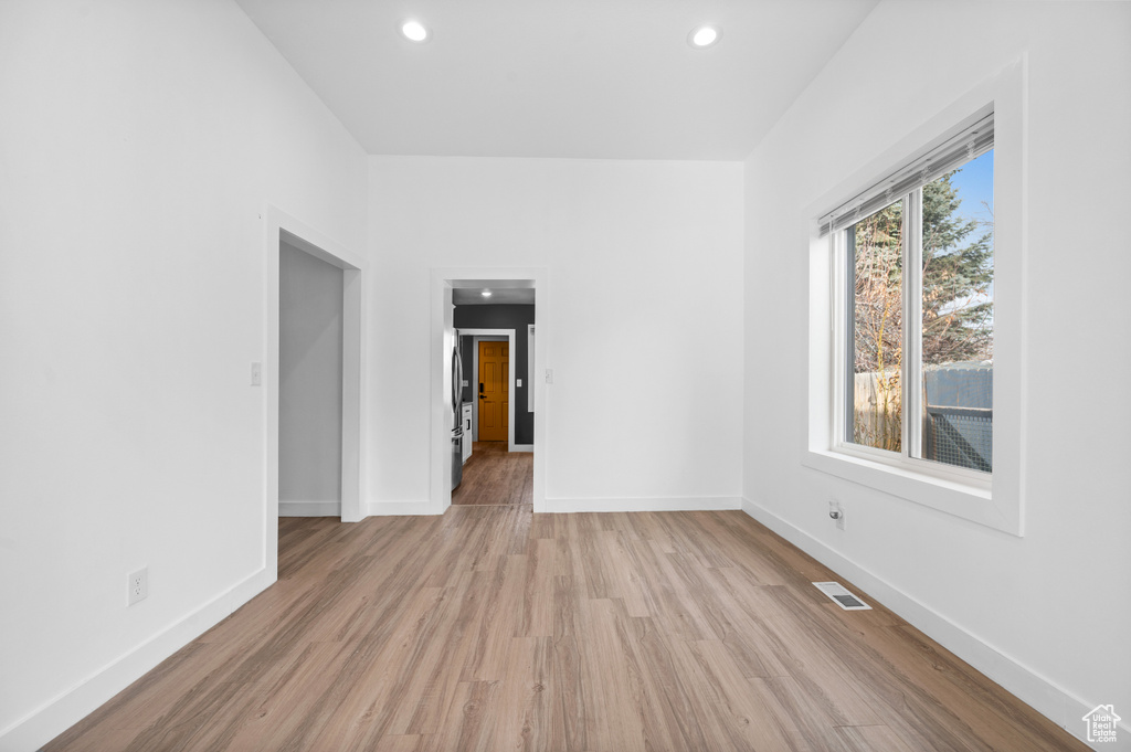 Empty room with light wood-type flooring