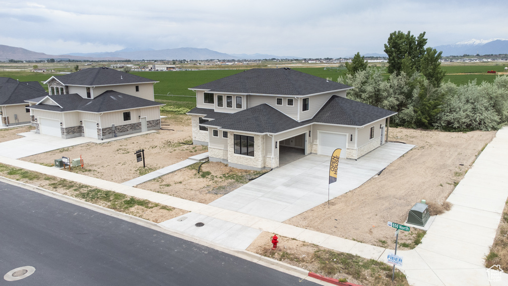 View from above of property with a mountainous background