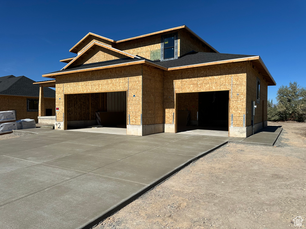 Unfinished property with a garage